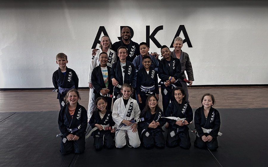 Kids jiu-jitsu Training: Children practicing jiu-jitsu techniques